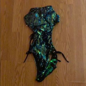 One piece swimsuit or rave wear